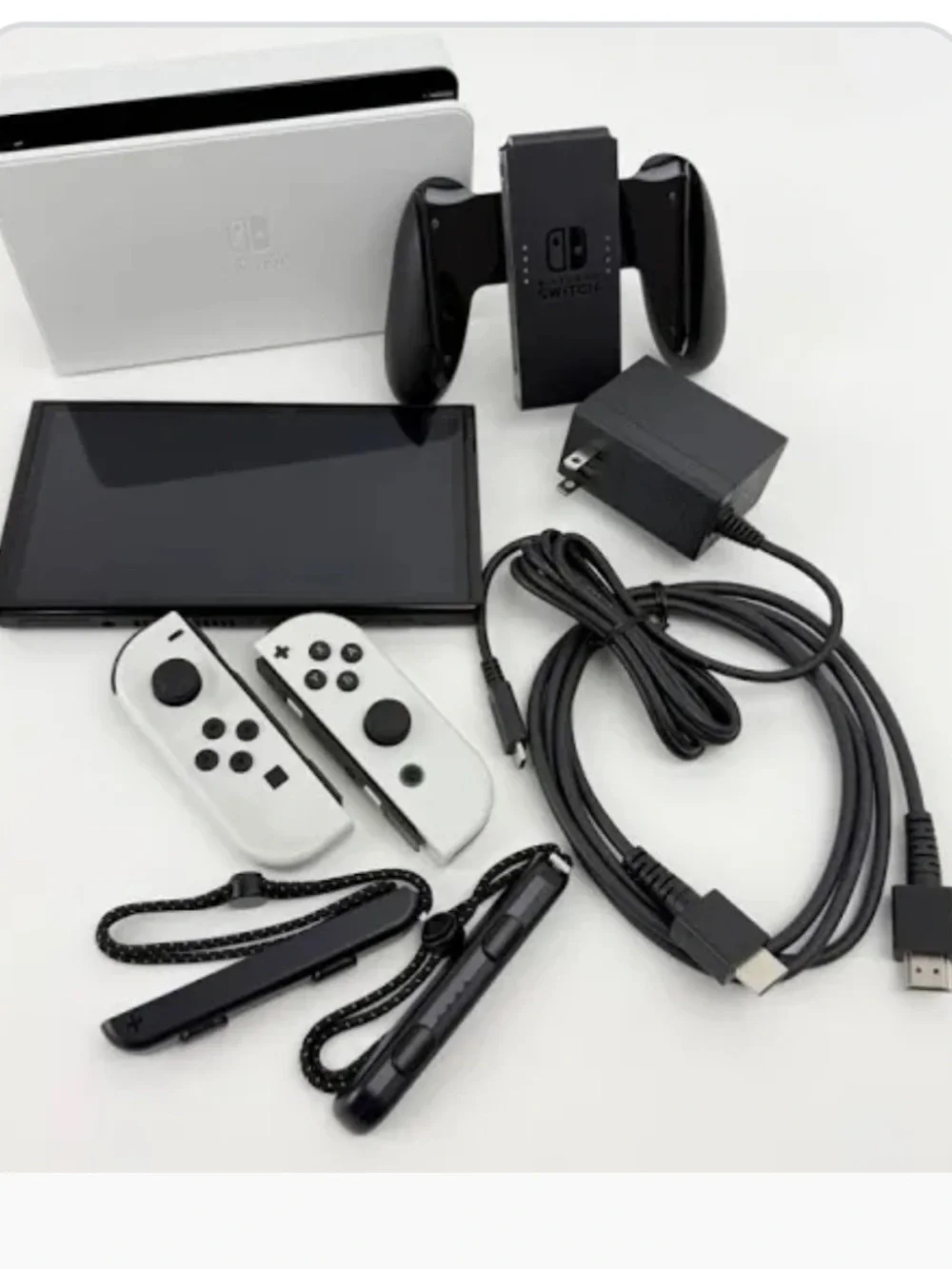 Nintendo Switch OLED Console with White Joy‑Con Accessories